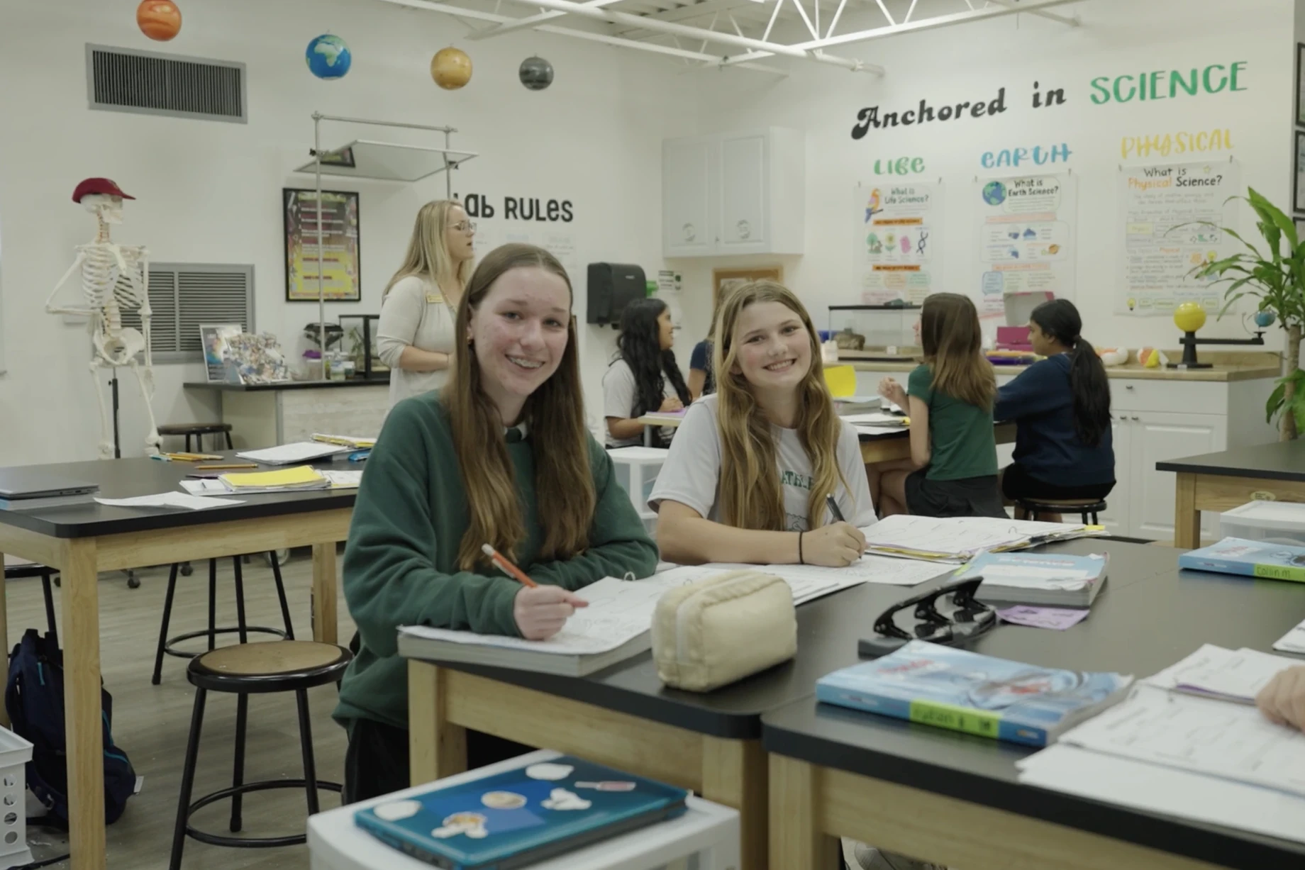 Students working at lab tables in the science room at Crestwell School